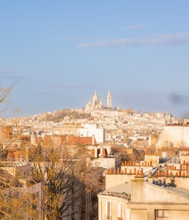 Monte Martre in Paris from a hill top with blue skies